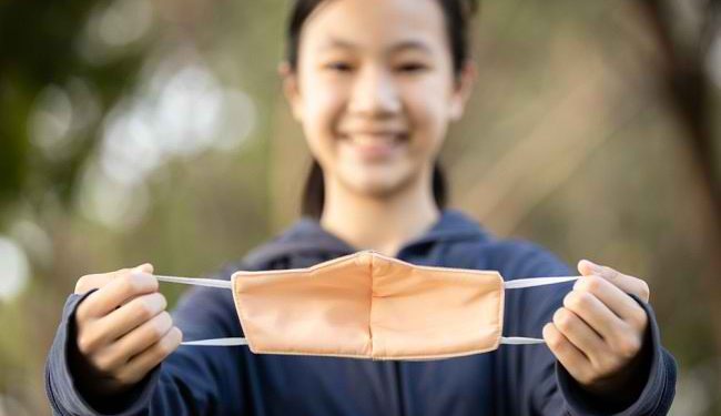 Cara Menggunakan Masker Kain untuk Mencegah Infeksi Virus Corona