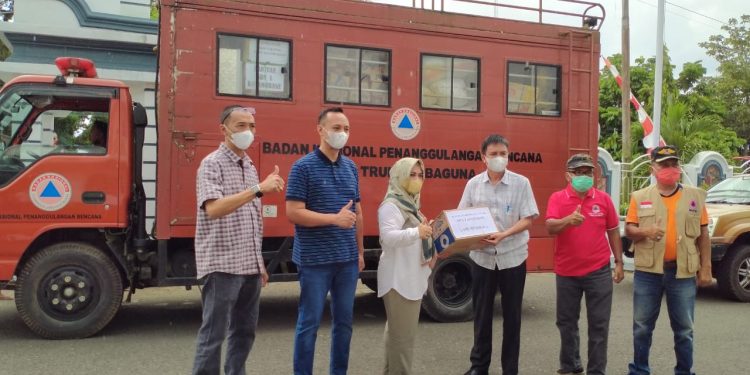 Pemkot Kotamobagu Salurkan Bantuan Korban Bencana di Mitra