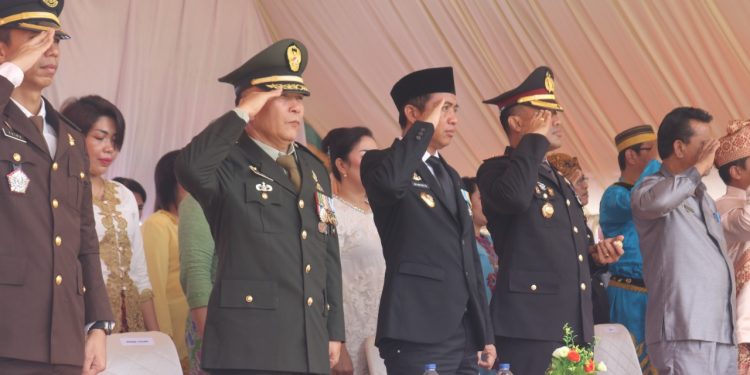 Bupati Boltim Hadiri Upacara HUT Bhayangkara ke-76