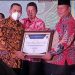 Wabup Bolsel Terima Penghargaan Stunting ke-2 se-Sulut