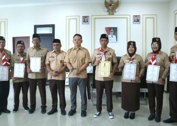 Bupati Boltim Terima Penganugerahan Tanda  Penghargaan Lencana Darma Bakti