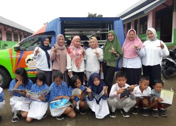 Dinas Perpustakaan Boltim Lakukan Pelayanan Mobil Perpustakaan Keliling di SDN 1 Modayag II