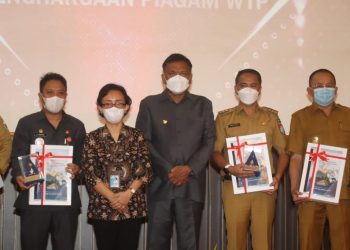 Hadiri Penyerahan DIPA dan Alokasi TKD, Bupati Boltim Terima Penghargaan atas Capaian WTP ke-9
