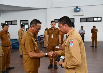 Bupati Boltim Tandatangani NPHD dan Serah Terima Kendis