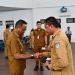 Bupati Boltim Tandatangani NPHD dan Serah Terima Kendis