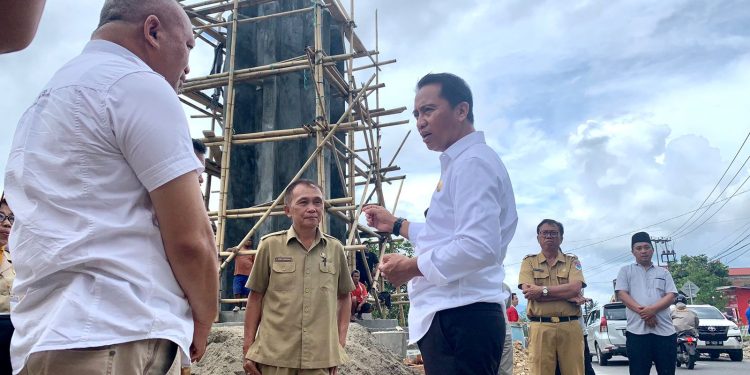 Bupati Tinjau Langsung Pembangunan Tugu Perbatasan Boltim dan Kotamobagu