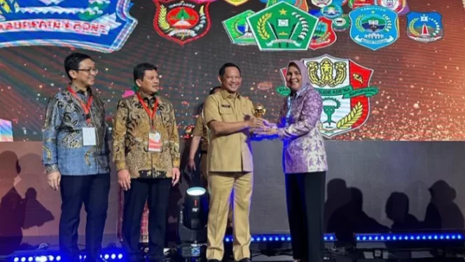 Membanggakan! Pemkot Kotamobagu Berhasil Raih UHC Award 2023