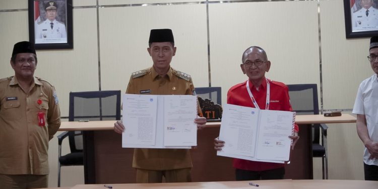 Bupati Bolsel dan PT. Bank Prisma Dana Teken MoU Tentang Kredit Wisata Bagi ASN
