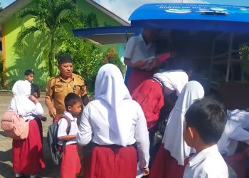 Dinas Perpustakaan Boltim Lakukan Pelayanan Mobil Perpustakaan Keliling di SDN 2 Togid