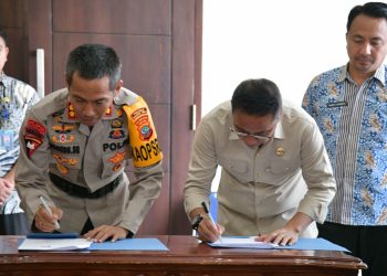 Bupati SSM Bersama Kapolres Boltim Tandatangani NPHD Pengamanan Pilkada 2024