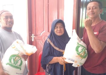 Pemdes Candi Rejo Salurkan Bantuan Pangan Beras 2024  kepada 28 KPM