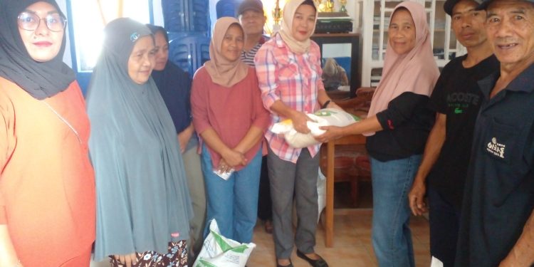 161 KPM di Desa Modayag II Terima Bantuan Pangan Beras 2024