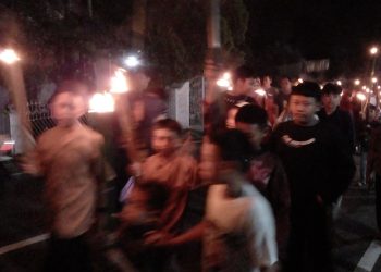 Sambut Bulan Penuh Ampunan, Pemdes Modayag III Bersama Remaja Masjid Al-Muhajirin Gelar Pawai Obor