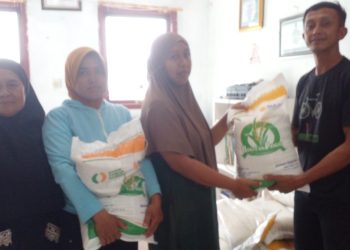 Di Bulan Suci Ramadhan, Pemdes Candi Rejo Salurkan Bantuan Pangan Beras Tahap III