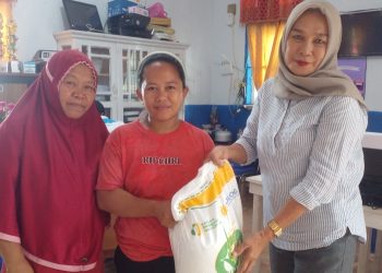 Di Bulan Suci Ramadhan, Pemdes Modayag II Salurkan Bantuan Pangan Beras Tahap III