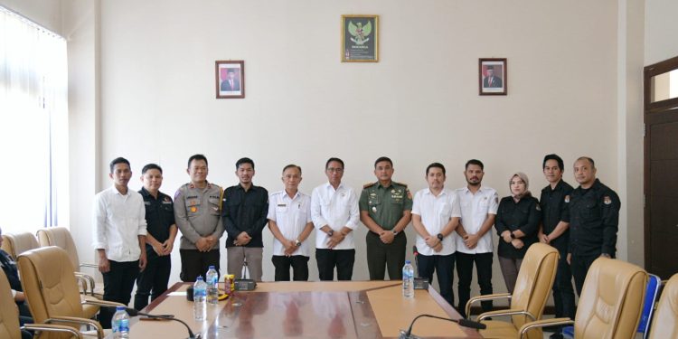 Bupati Boltim Bersama KPU, Bawaslu dan Kodim 1303 Bolmong Teken NPHD Pilkada 2024