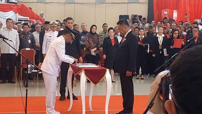 Gubernur Olly Lantik Jusnan C Mokoginta sebagai Pj Bupati Bolmong
