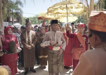Pj Bupati Bolmong Jusnan C Mokoginta Dijemput Secara Adat