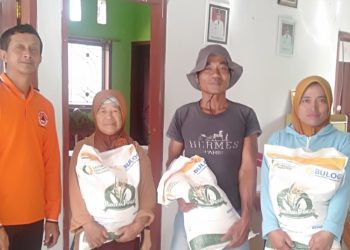 Jelang Idul Adha, Pemdes Candi Rejo Salurkan Bantuan Pangan Beras Tahap V