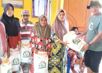 Pemdes Purworejo Timur Salurkan Bantuan Pangan Beras Tahap V