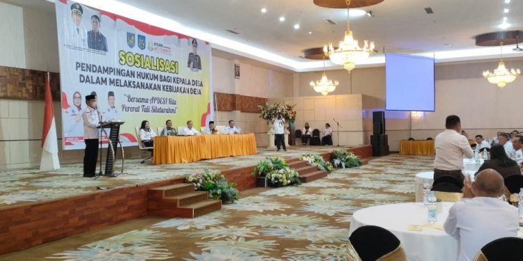Pj Bupati Bolmong Buka Sosialiasi Pendampingan Hukum Kepala Desa