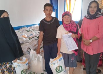 Pemdes Modayag II Salurkan Bantuan Pangan Beras Tahap VII