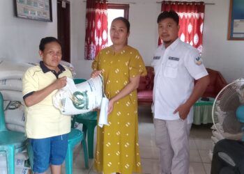 Pemdes Modayag III Salurkan Bantuan Pangan Beras Tahap VII