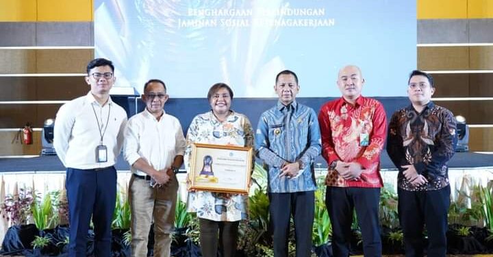 Pj Bupati Bolmong Hadiri Penganugerahan Paritrana Awards