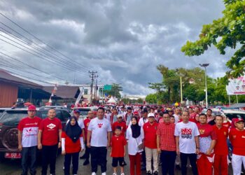 Semarakkan HUT RI ke-80, Pemkab Bolsel Gelar Jalan Sehat dan Pemasangan Umbu-umbul Merah Putih