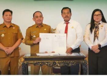 Pemkab Bolmong dan Kejari Kotamobagu Teken MoU, Perkuat Pendampingan Hukum