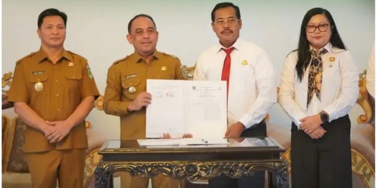 Pemkab Bolmong dan Kejari Kotamobagu Teken MoU, Perkuat Pendampingan Hukum