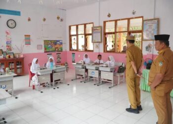 Iskandar-Deddy Tinjau Pendistribusian MBG di Kecamatan Bolaang Uki