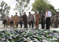 Walikota Weny Gaib Hadiri Kegiatan Pemusnahan Barang Bukti Minuman Beralkohol di Kejari Kotamobagu